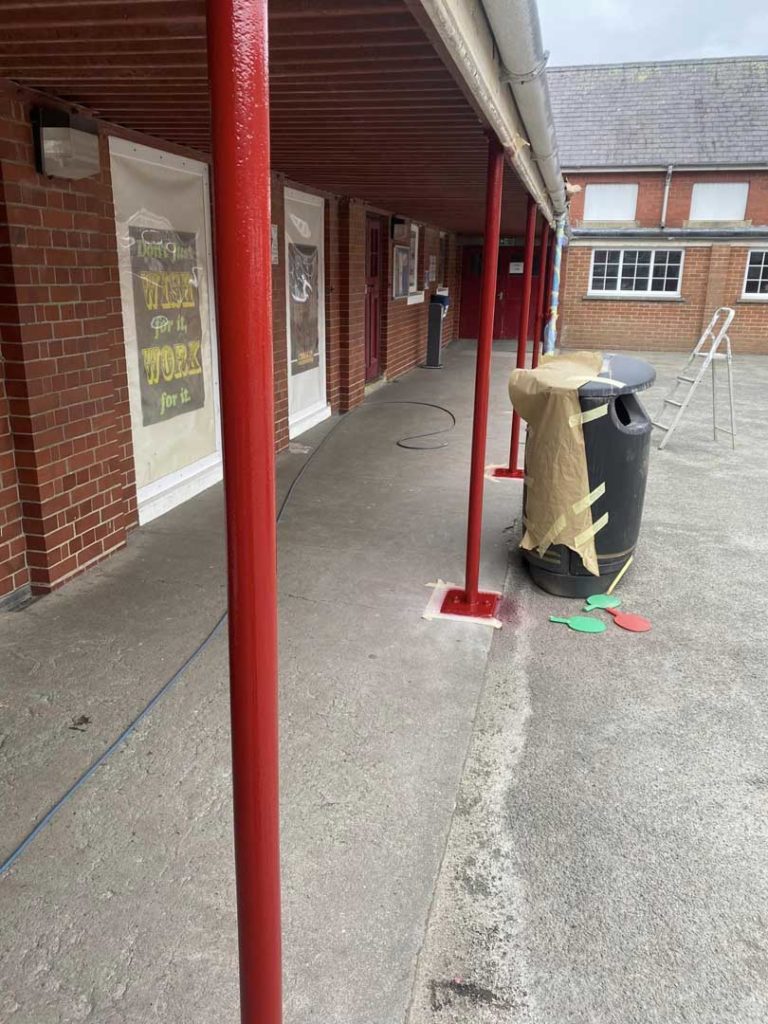 red pole in playground